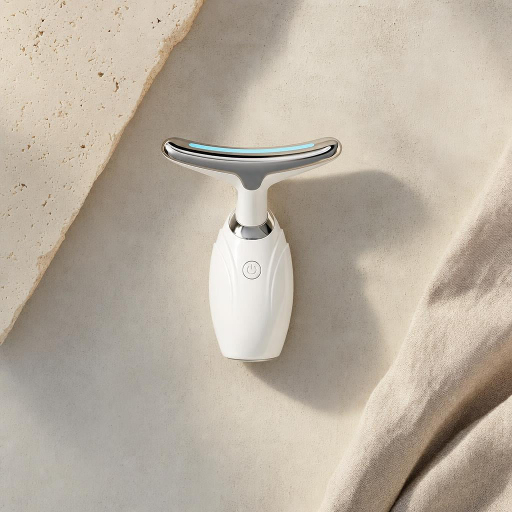 Neck and face LED massager in white and silver with blue light bar