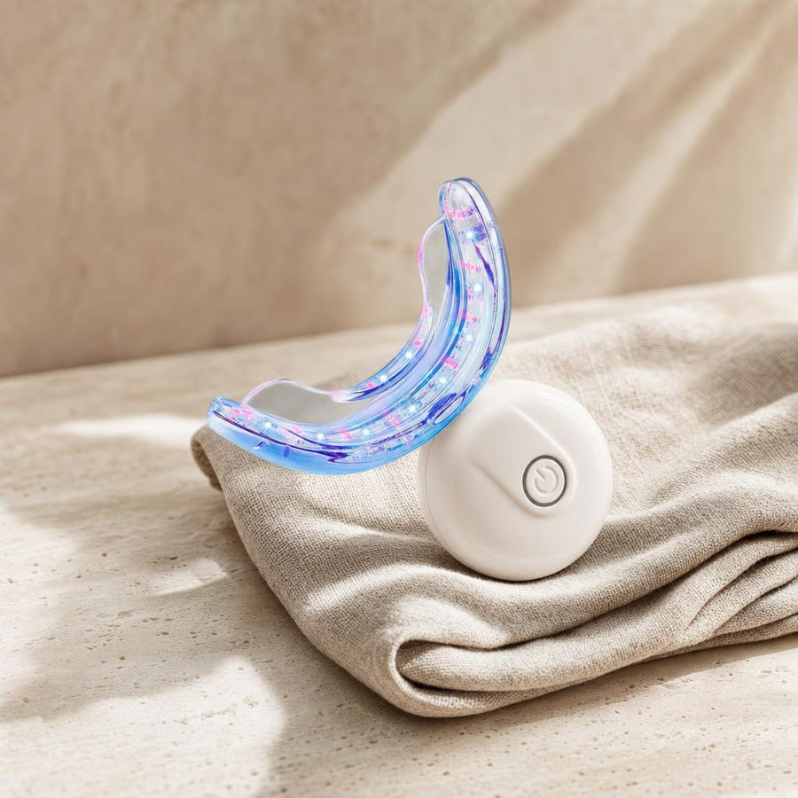 LED teeth whitening kit with wireless mouth tray and charging puck